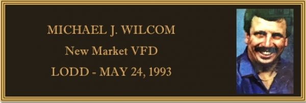 WILCOM, Michael J.